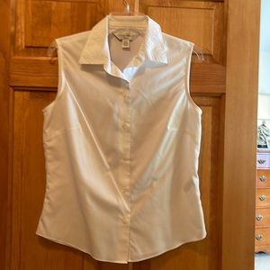 Sleeveless white blouse